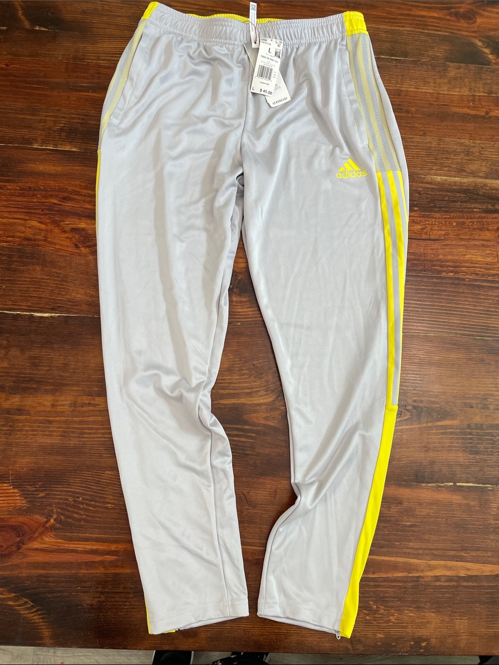 adidas Men's Light Gray Joggers with Yellow Stripes